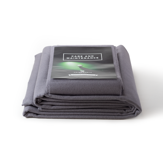 Hainsworth-SMART folded silver pool table cloth with a care and maintenance card on a white background