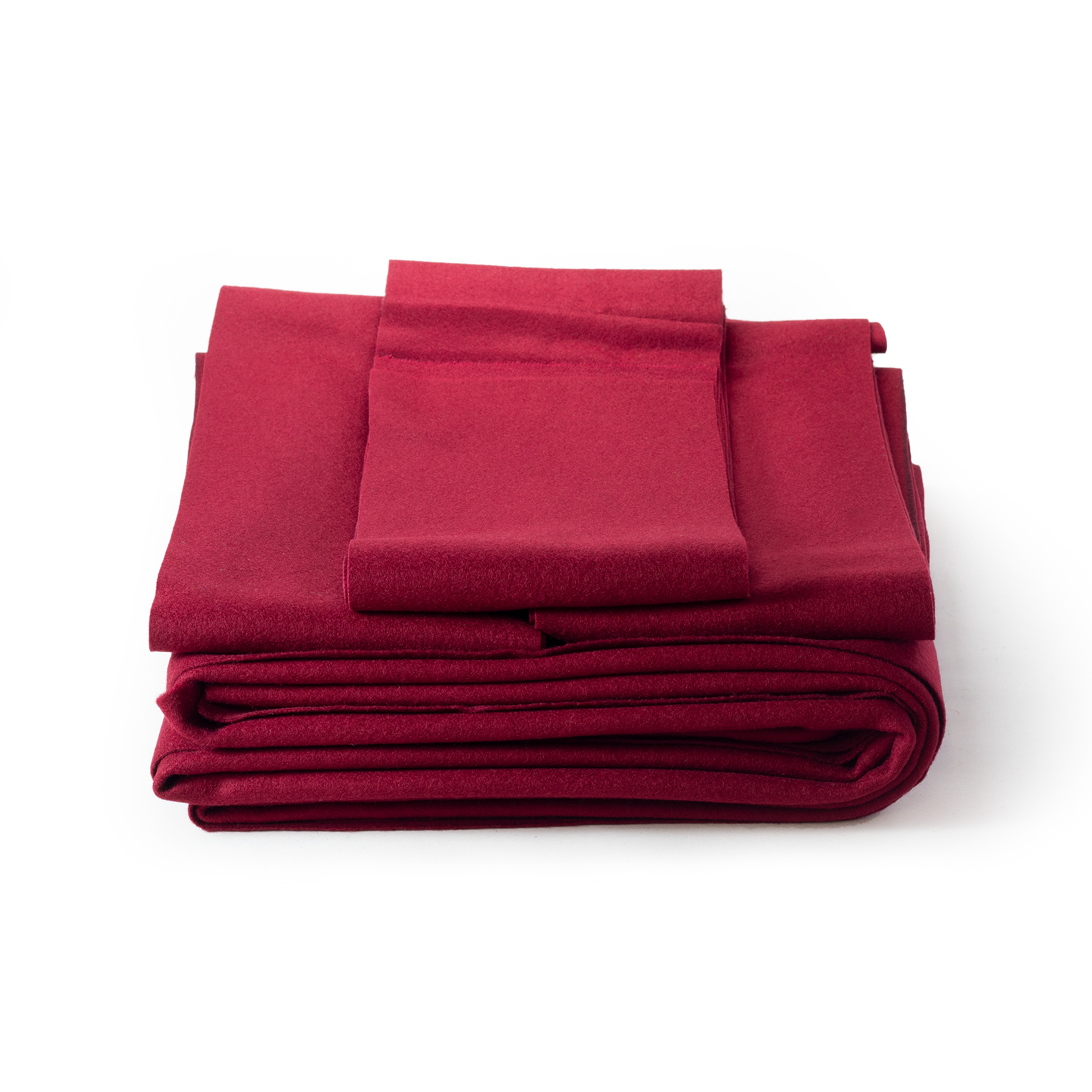 Folded red fabric pool cloth set on a white background