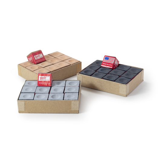Three cardboard boxes with grey and red chalk for pool and snooker cues on a white background